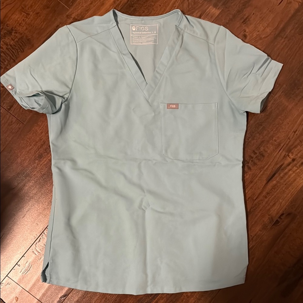 FIGS Women's oasis Blue one pocket scrub Top